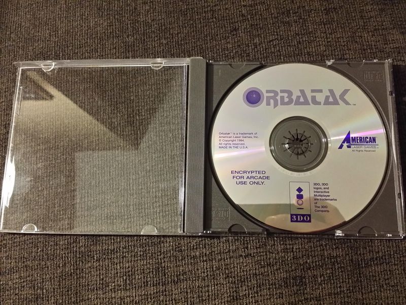 File:Orbatak Arcade Disc 2.jpg